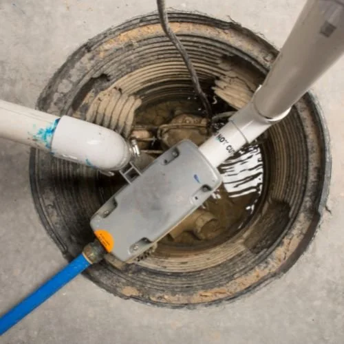 Sump pump installed in a basement pit